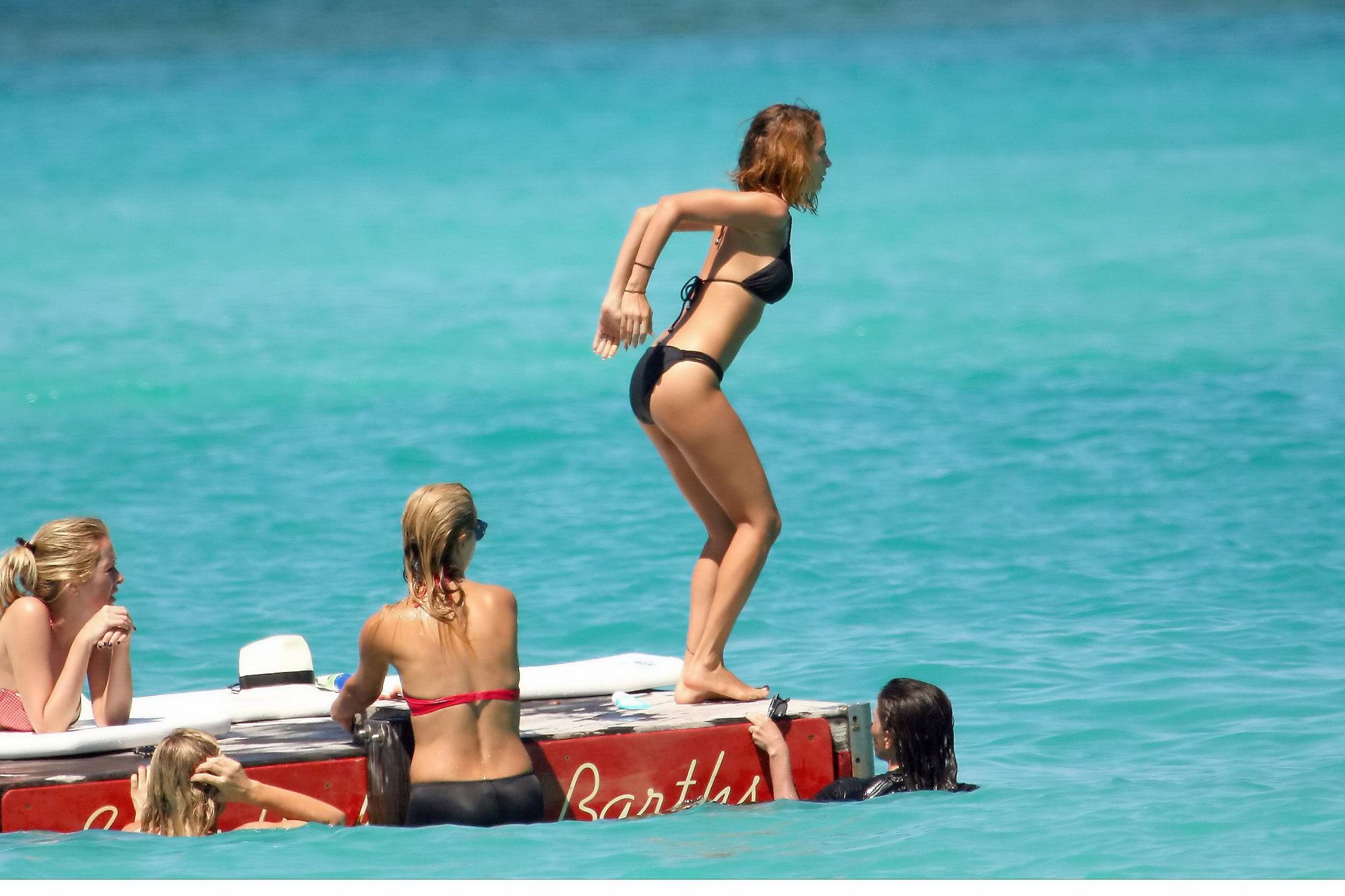 Nicole Richie wearing a sexy black bikini on a beach in St. Barts #75235514