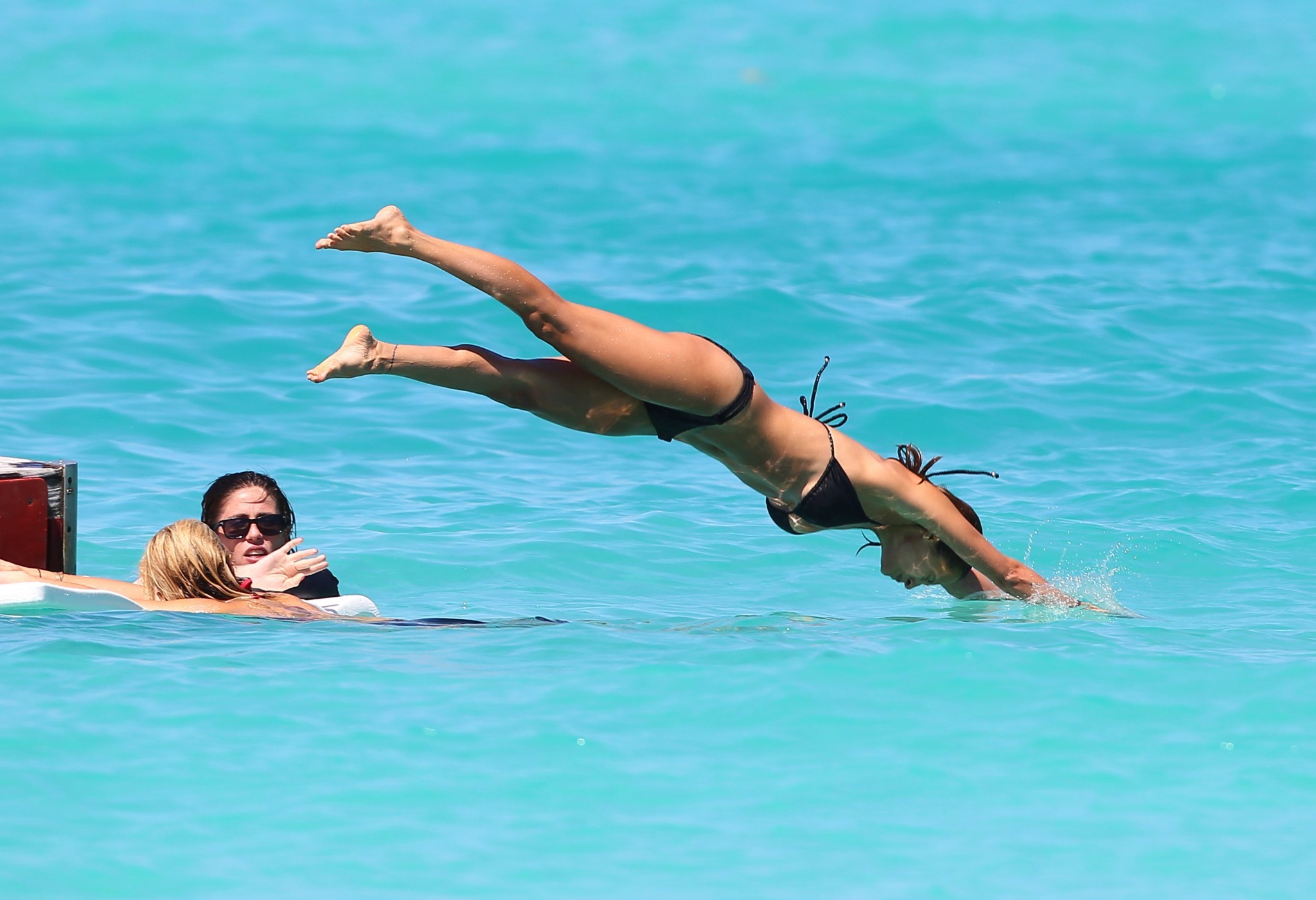 Nicole Richie wearing a sexy black bikini on a beach in St. Barts #75235536