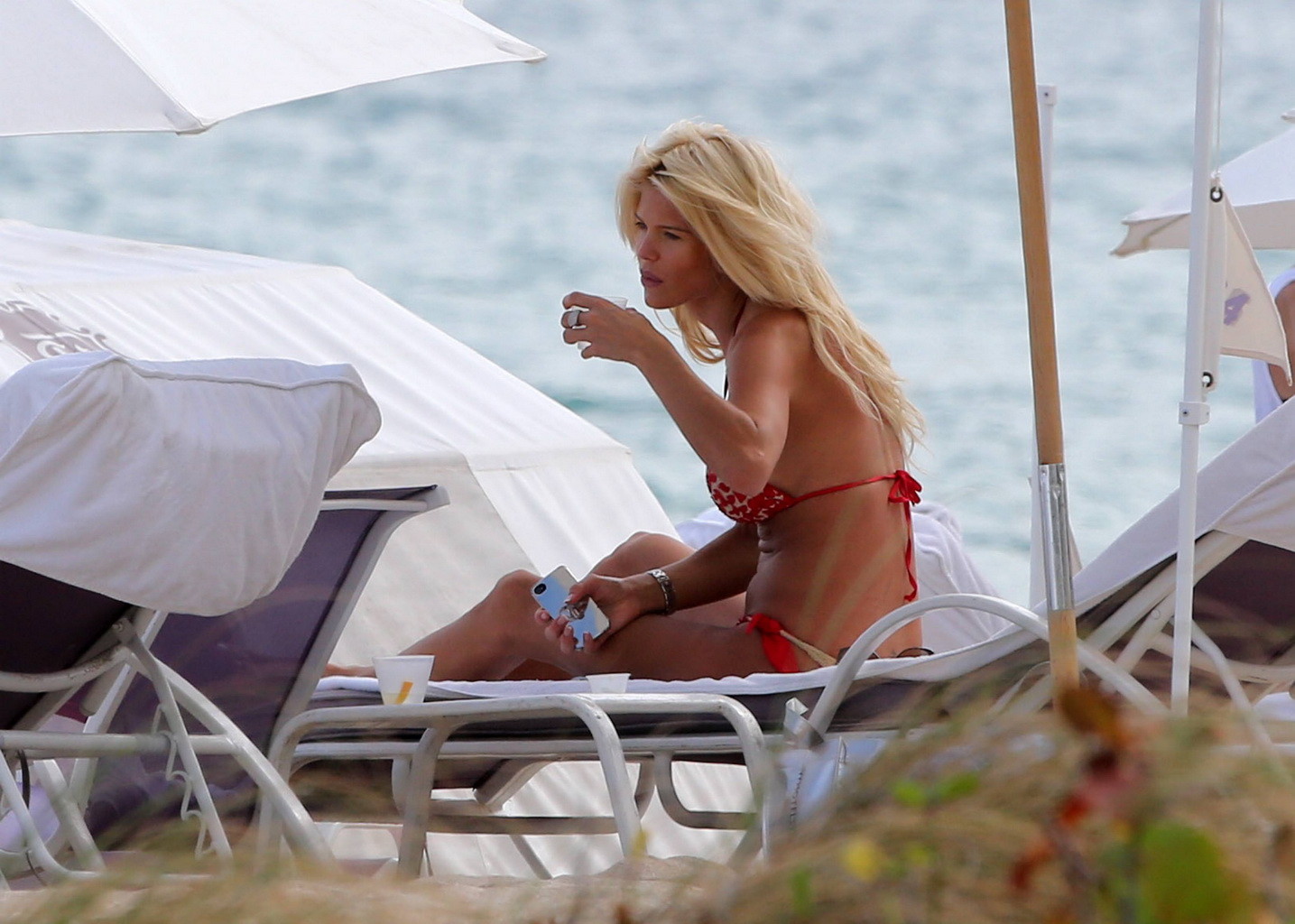 Victoria Silvstedt busty wearing skimpy clover print bikini at the beach in Miam #75248309