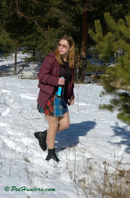 Teen peeing in the snow forest #78616142