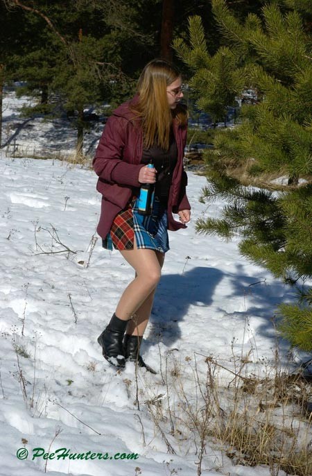 Teen peeing in the snow forest #78616148