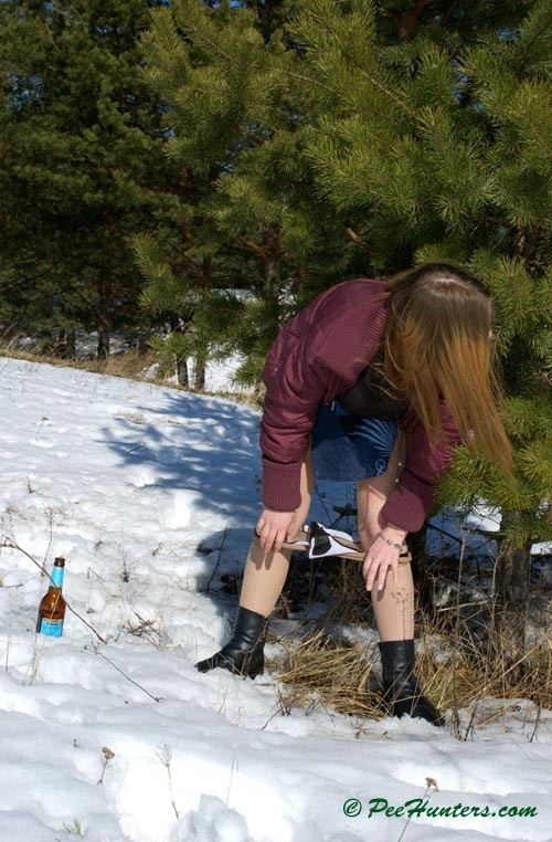 Teen peeing in the snow forest #78616233