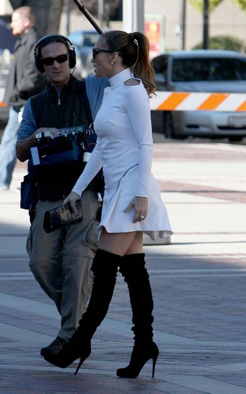 Jennifer Lopez en bottes "fuck me" et cache-tétons sur scène
 #75321260