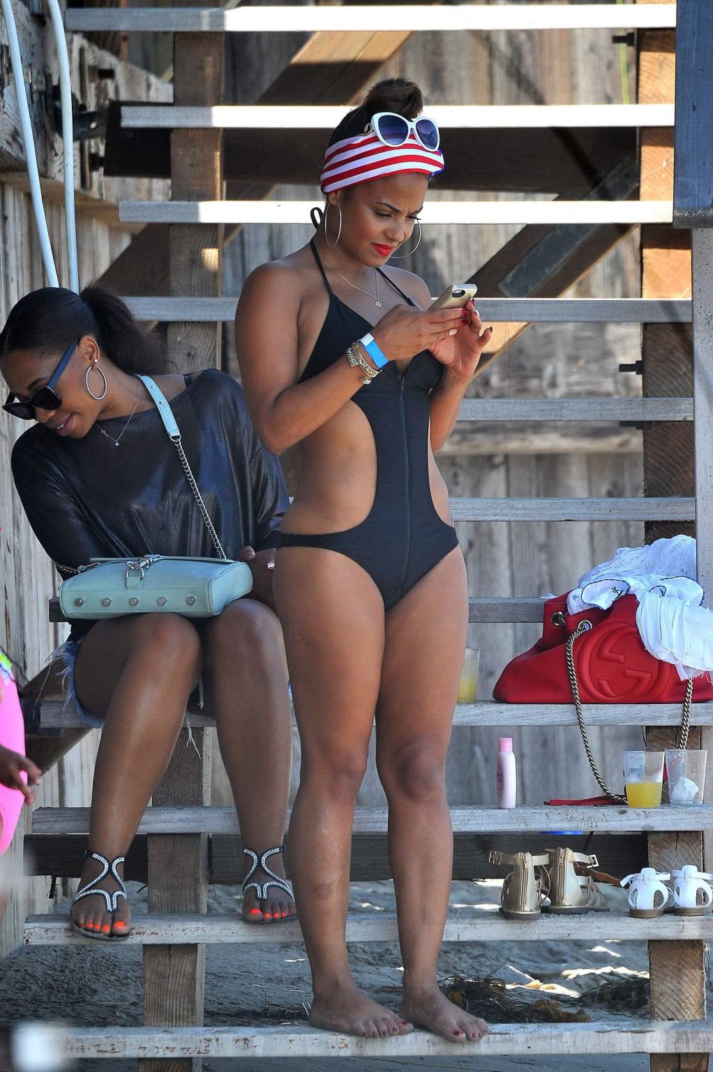 Christina Milian wearing a sexy black swimsuit at Paris Hiltons 4th of July part #75191762