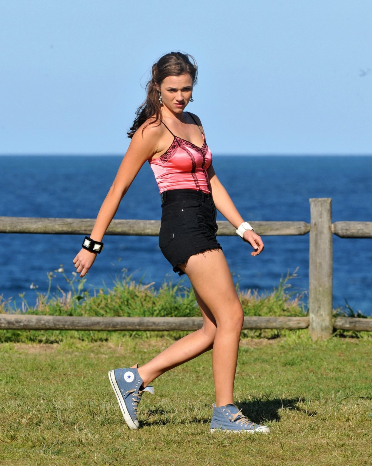 Demi Harman wearing a corset and black shorts on Home  Away set at Palm Beach in #75184887