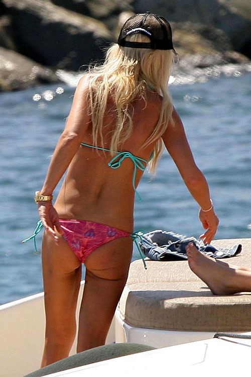 Tara Reid showing her ass in bikini and tits slip paparazzi pictures #75385936