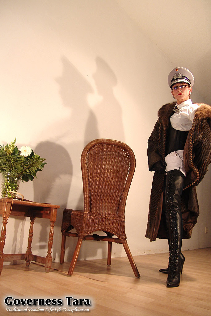 Mature but strict mistress in leather and fur coat posing #72186988