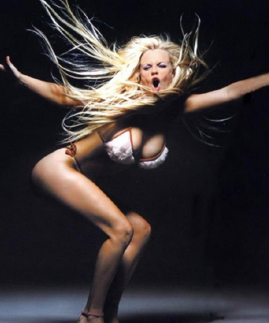 Sweet blonde celeb Jenny McCarthy nice boobs in black costume #75414787