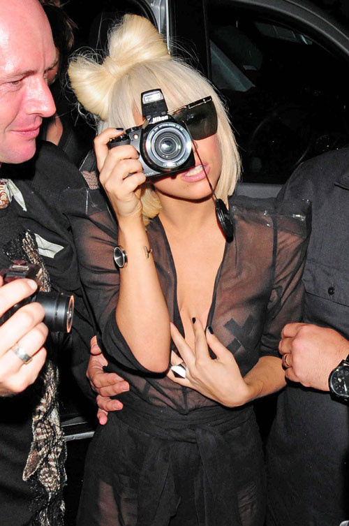 Lady Gaga showing her nice tits in see thru dress and upskirt paparazzi pictures #75398028