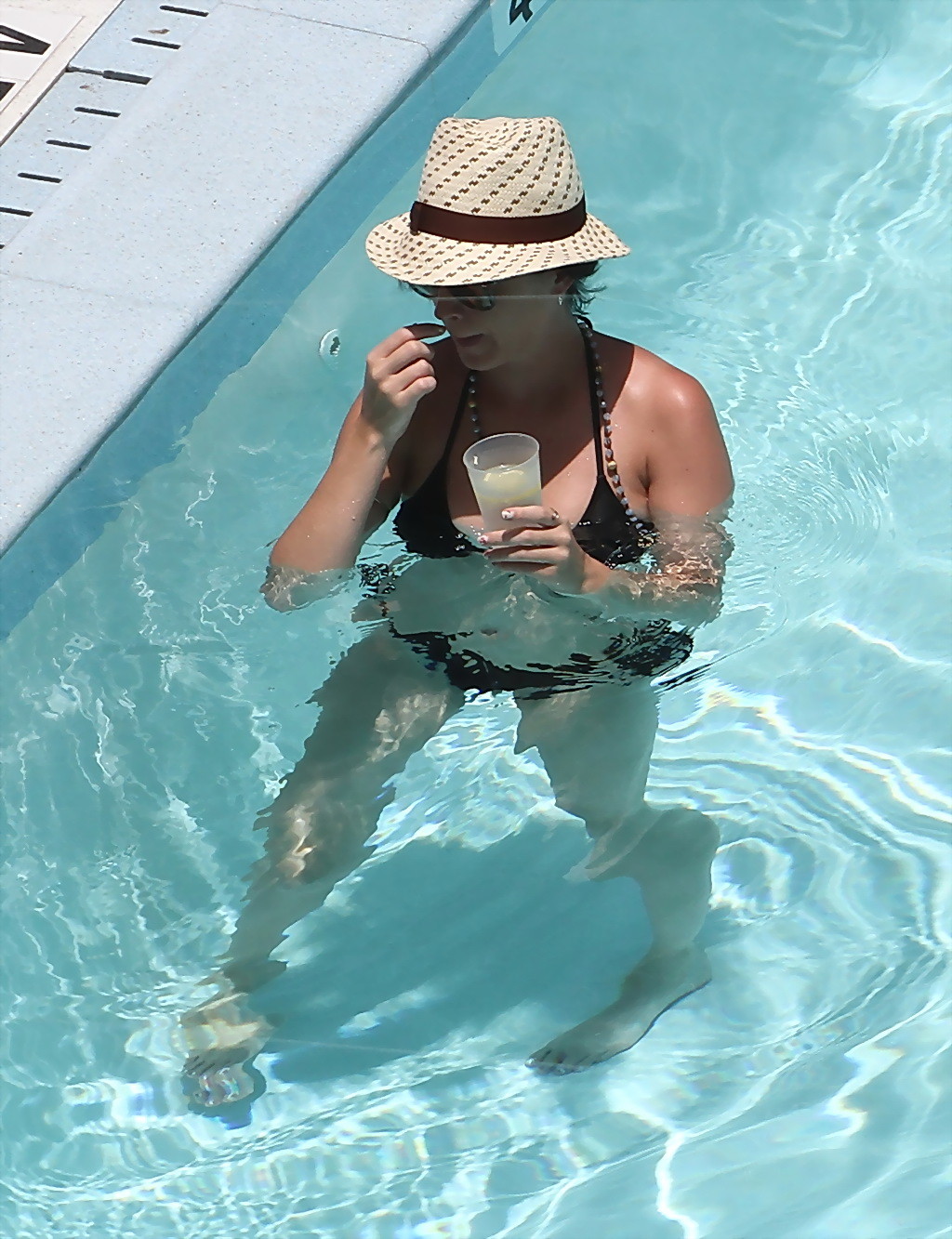 Katy Perry showing off her curvy body in skimpy black bikini at the pool in Miam #75256054