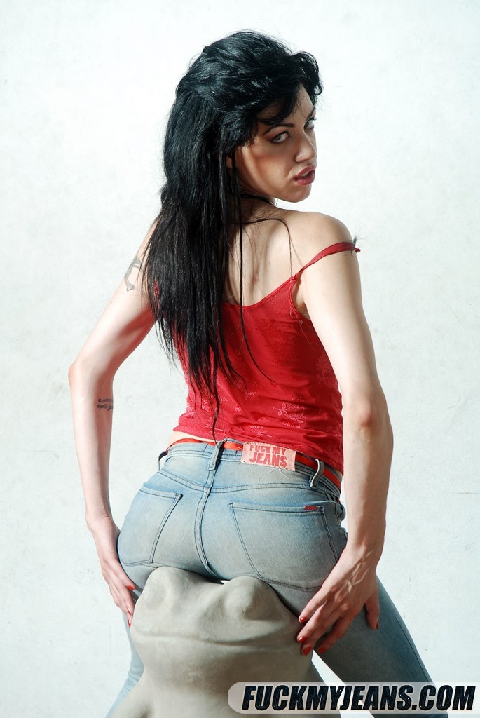 Black haired babe posing and teasing in tight denim blue jeans #71236866