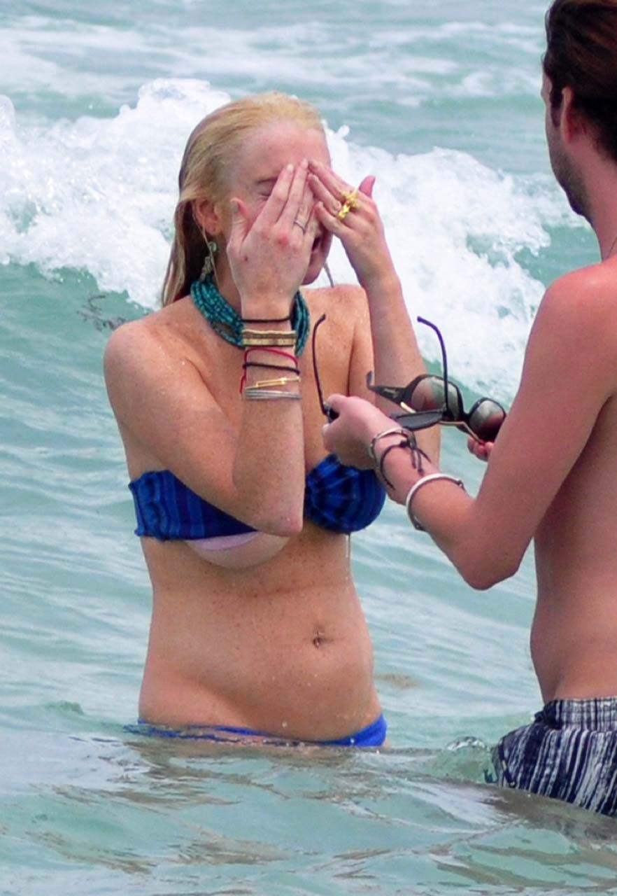 Lindsay Lohan sexy and hot bikini and boob slip paparazzi photos #75303076