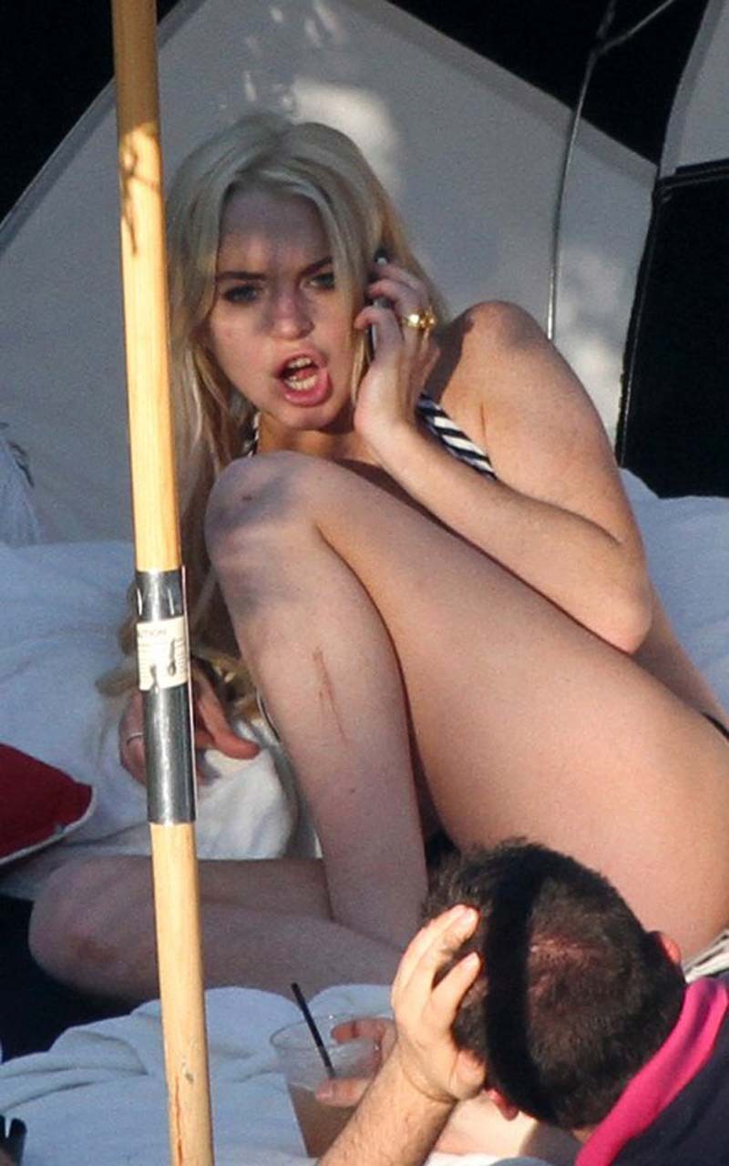 Lindsay Lohan sexy and hot bikini and boob slip paparazzi photos #75303110