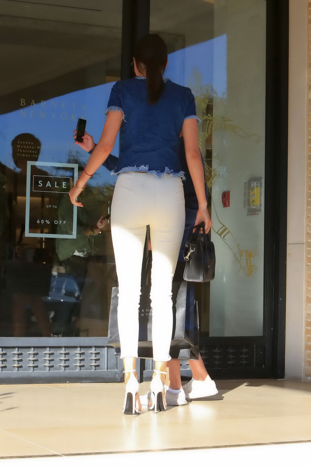 Kendall Jenner showing ass in tight white pants and denim top while shopping in  #75177167
