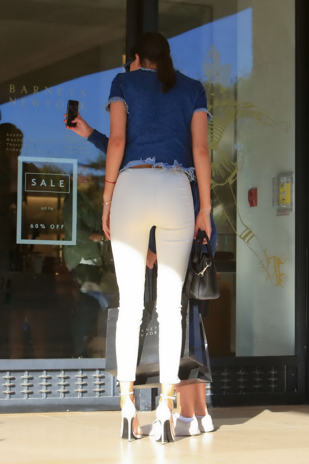 Kendall Jenner showing ass in tight white pants and denim top while shopping in  #75177174