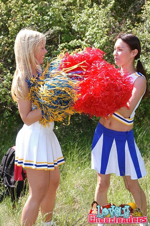 Two heady cheerleaders licking and toying their snatches outdoors #73505979