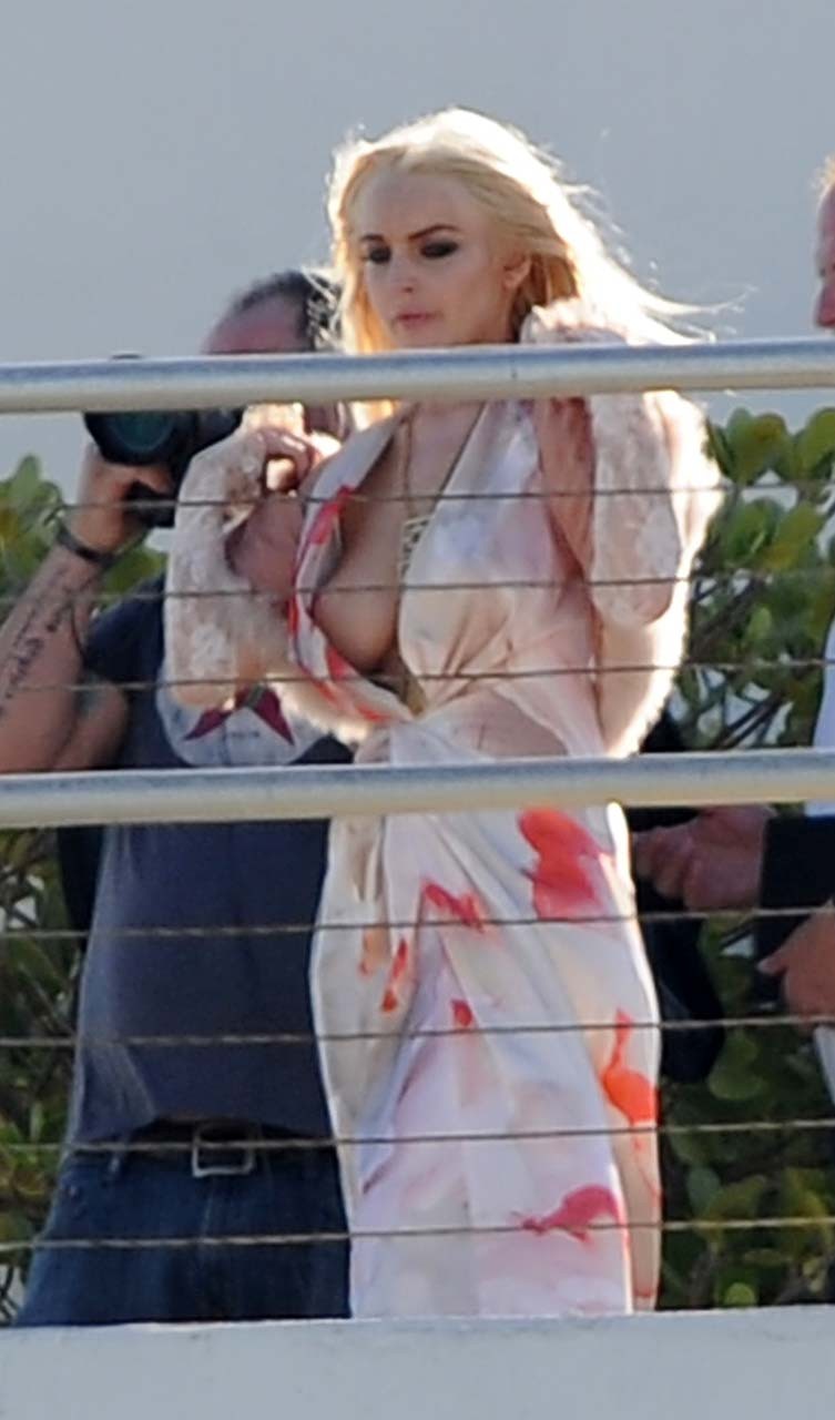 Lindsay Lohan very sexy and hot boob slip and upskirt paparazzi photos #70315547