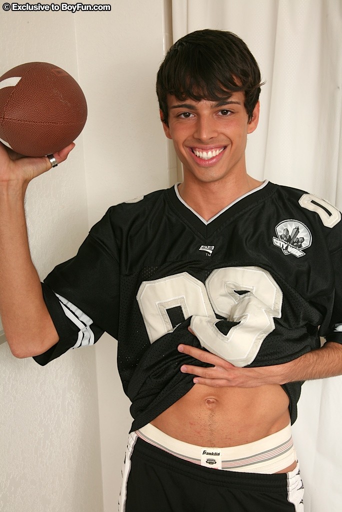 Athletic boy Sterling stuffs football into his ass. #76918648
