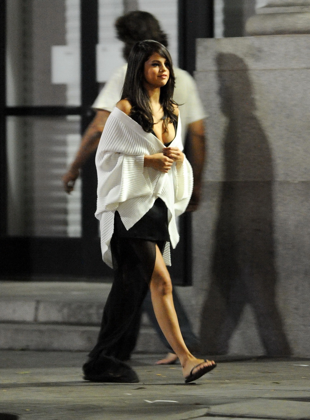 Selena Gomez busty wearing a low cut dress on the set #75154981