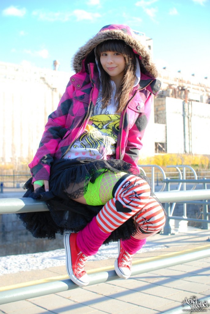 Grunge punk girl outside wearing hoodie #77773417