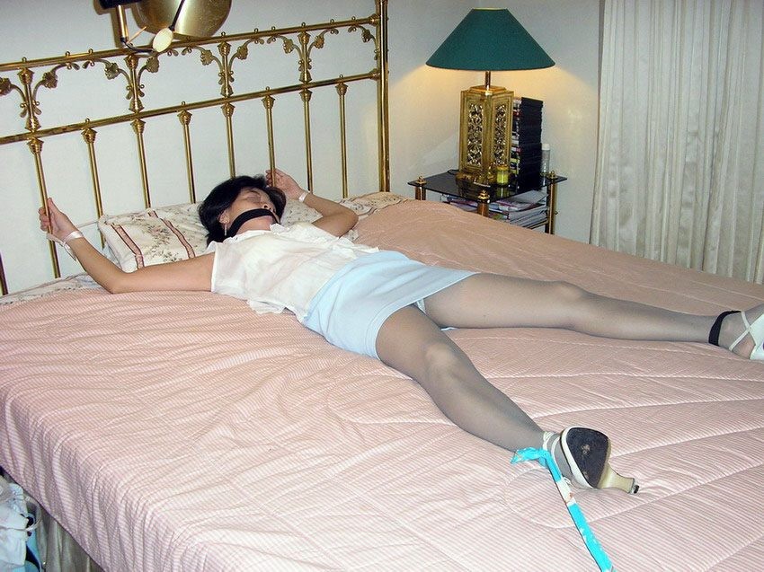 Asian housewife gets tied down to her bed and gagged #67649595
