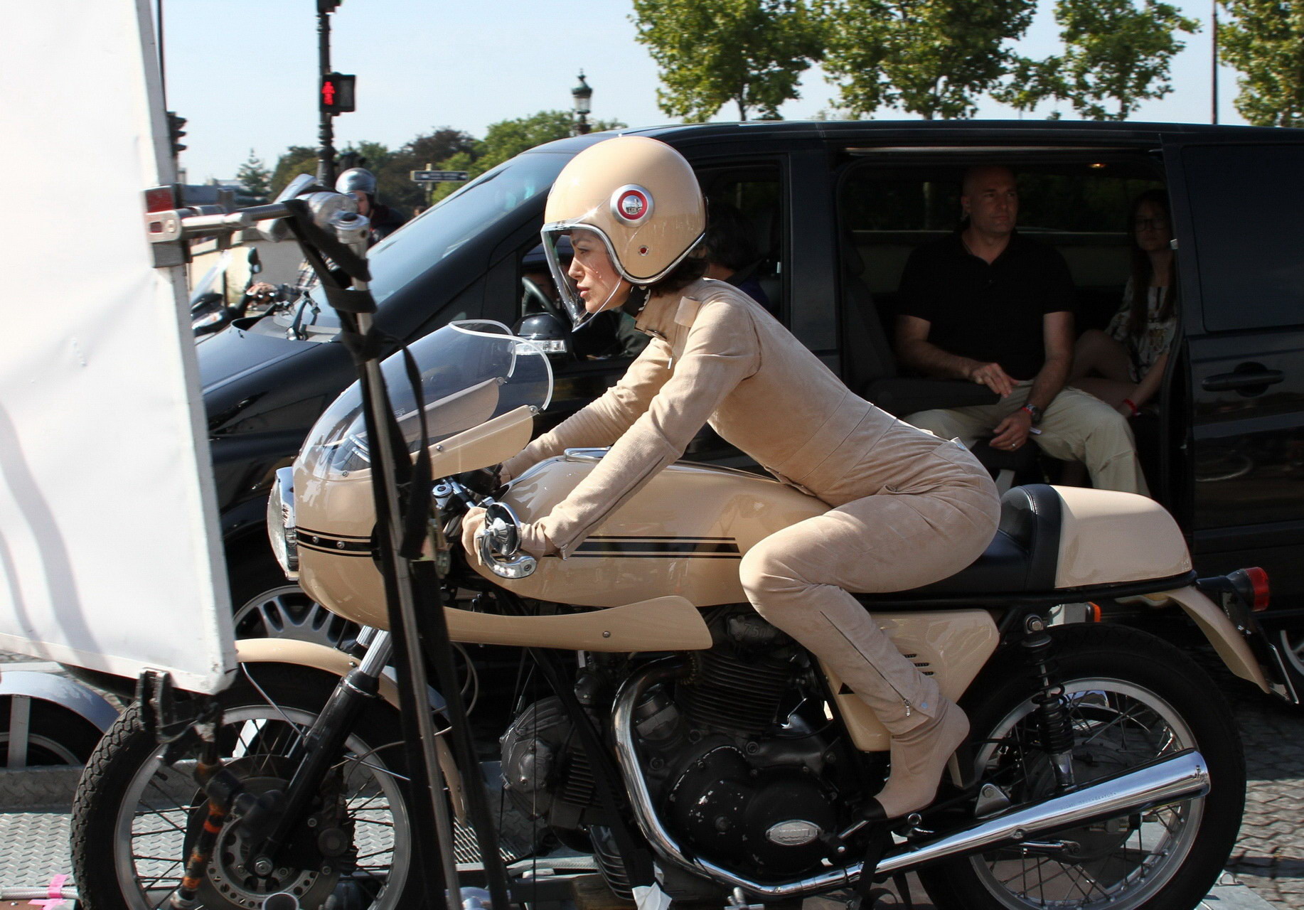 Keira Knightley in tight retro motorcycle suit shooting a commercial in Paris #75334747