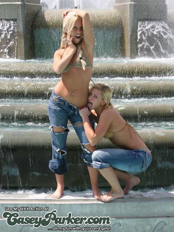 Two cute chicks playing around in the fountain #78626808