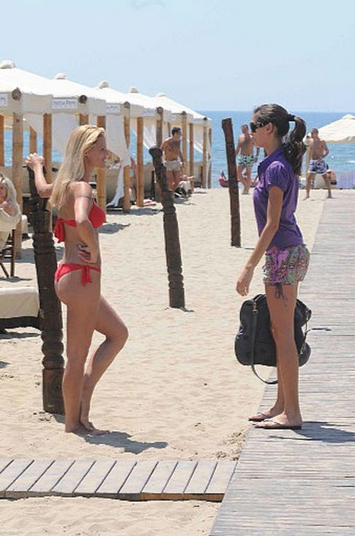 Michelle Hunziker showing big tits on beach paparazzi pictures #75417905