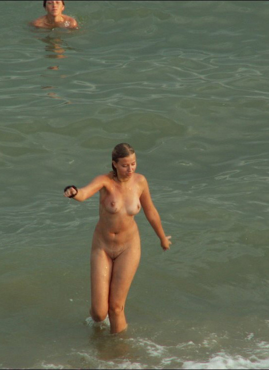 Pleasant young Russian nudists lay on the seashore #72252107