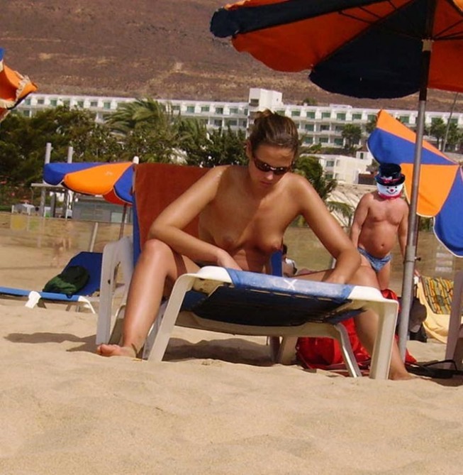 Friendly young Russian nudists lay on the beach #72252139