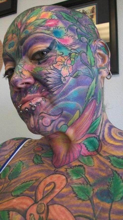 extremely tattooed and pierced heads #67372311