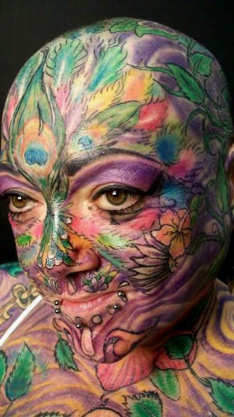 extremely tattooed and pierced heads #67372325