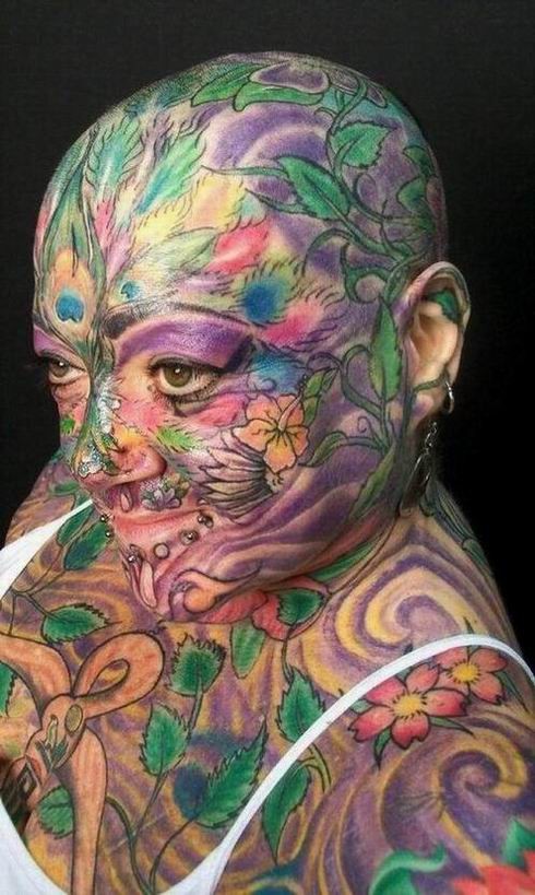 extremely tattooed and pierced heads #67372331