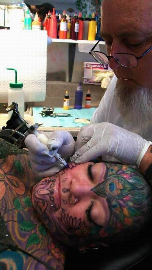 extremely tattooed and pierced heads #67372348
