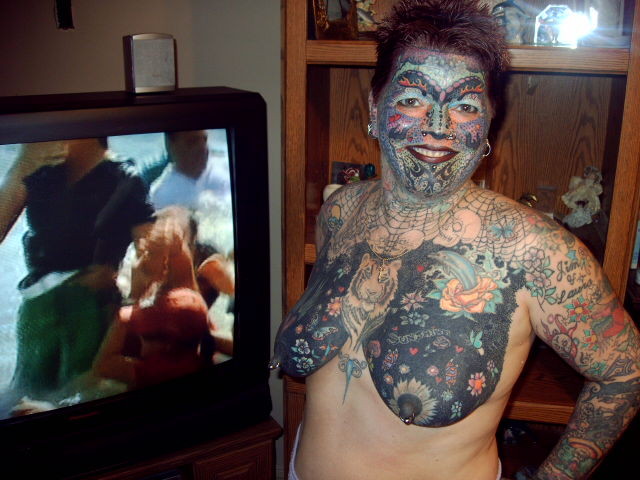 Extreme tattoo and piercing #73229641