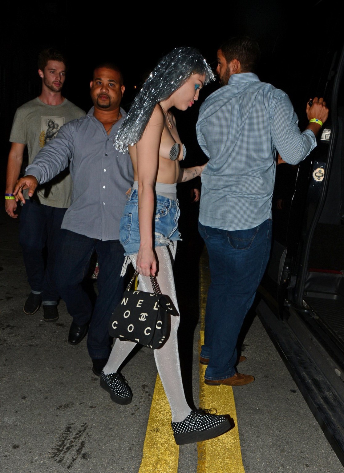 Miley Cyrus topless but wearing pasties and pantyhose at Art Basel in Miami #75179262