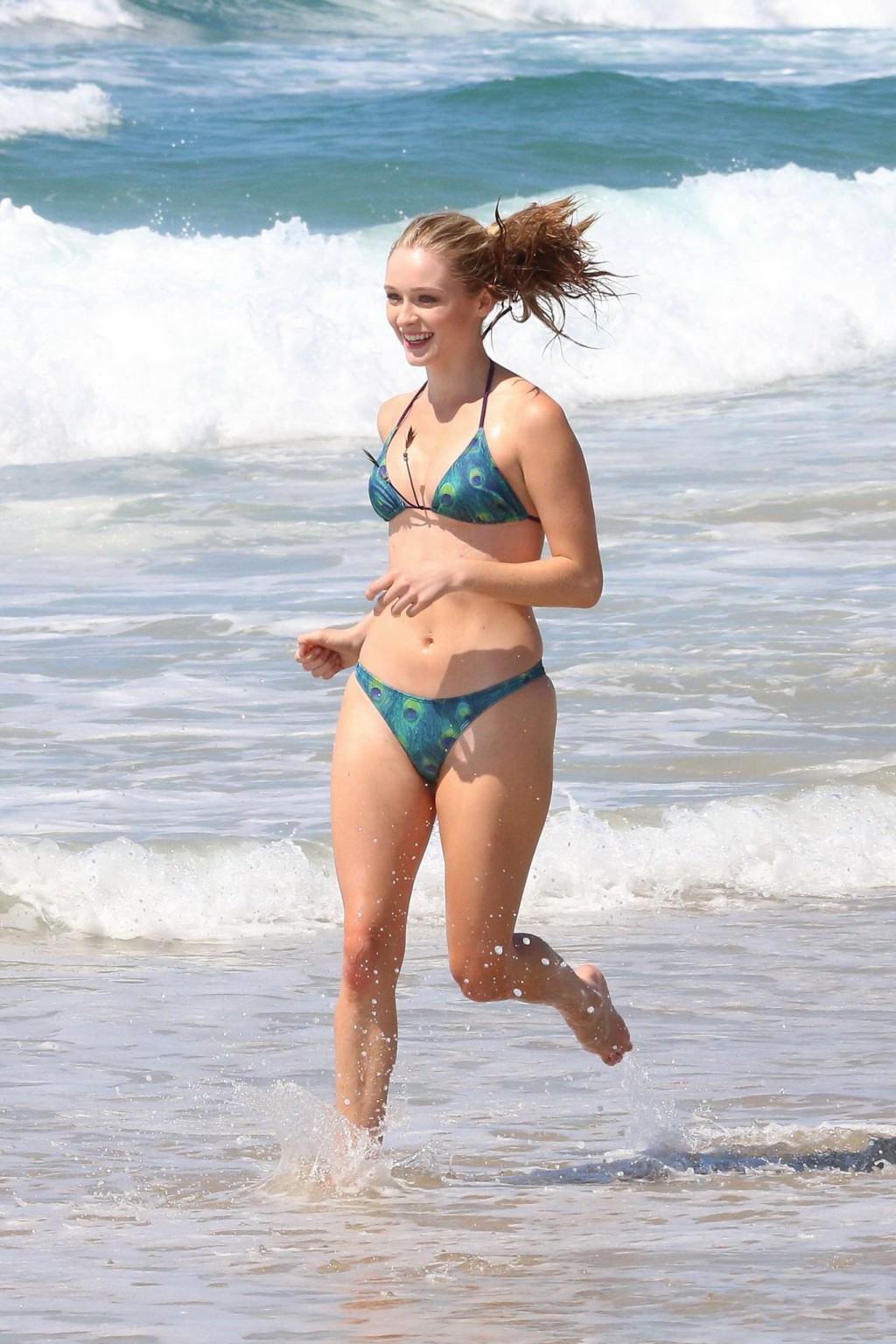 Greer Grammer busty in tiny peacock feather print bikini at the beach in Los Ang #75168203