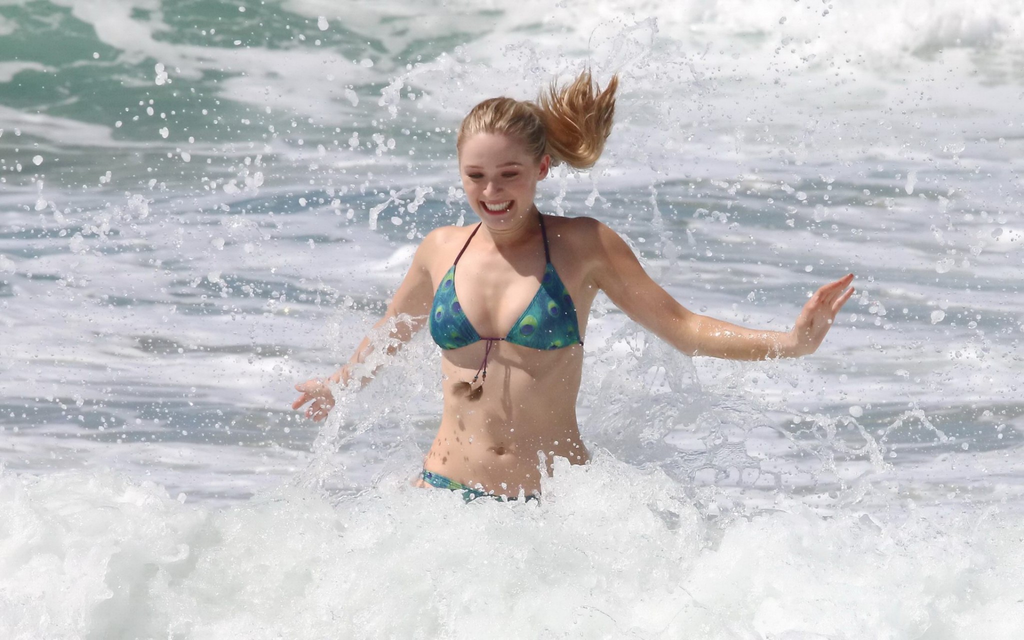 Greer Grammer busty in tiny peacock feather print bikini at the beach in Los Ang #75168215
