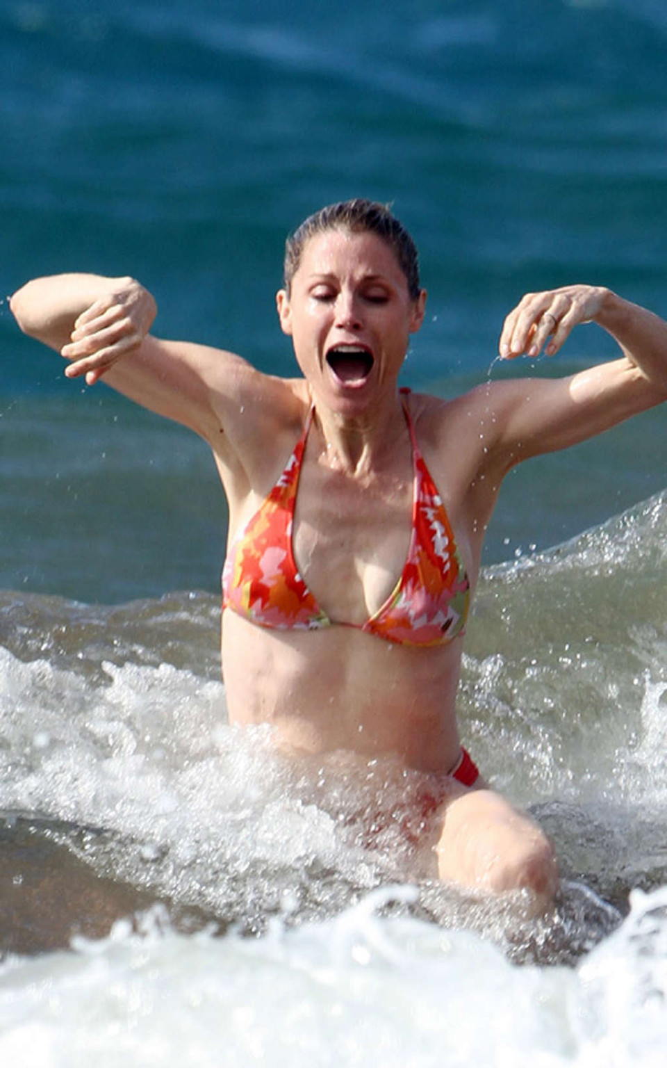 Julie Bowen tits slip and posing nude and in bikini on beach #75356982