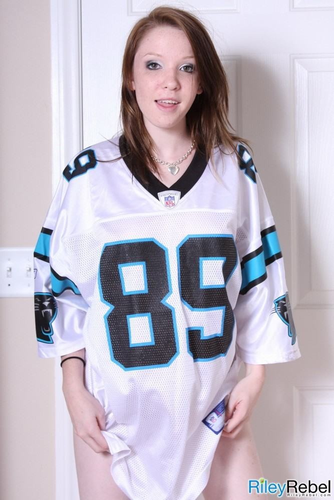 Petite small titted eighteen year old poses in football jersey #78764781