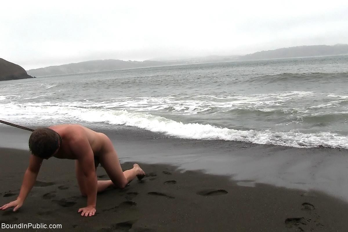 Gay being used and abused outdoor on a public beach. #76900511