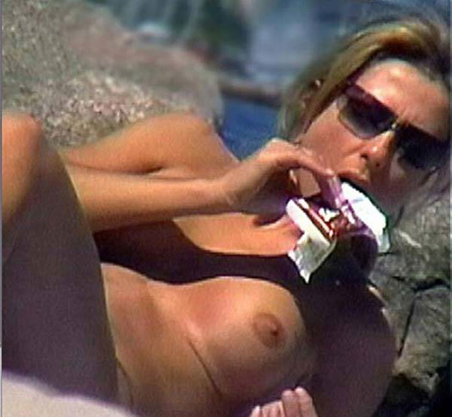 Jennifer Aniston showing topless on the beach #75313977