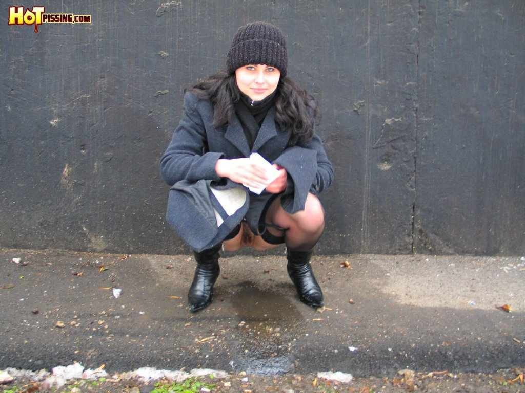 Girl pissing outdoors in the cold #76593289