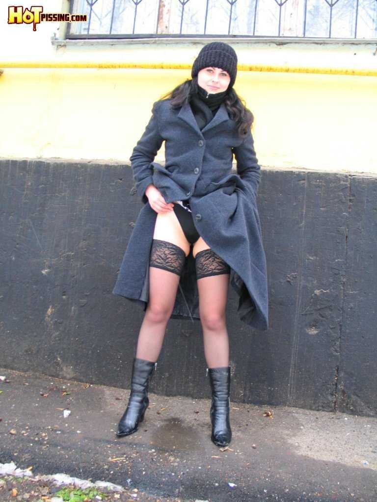 Girl pissing outdoors in the cold #76593333