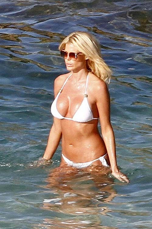 Victoria Silvstedt posing on beach and showing huge boobs in white bikini #75276891