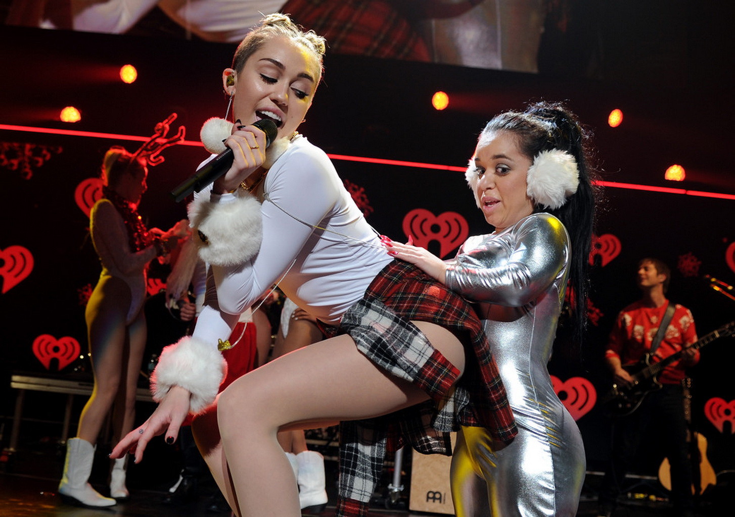 Miley Cyrus wearing white transparent bodysuit at Y100 Jingle Ball 2013 in Miami #75209697