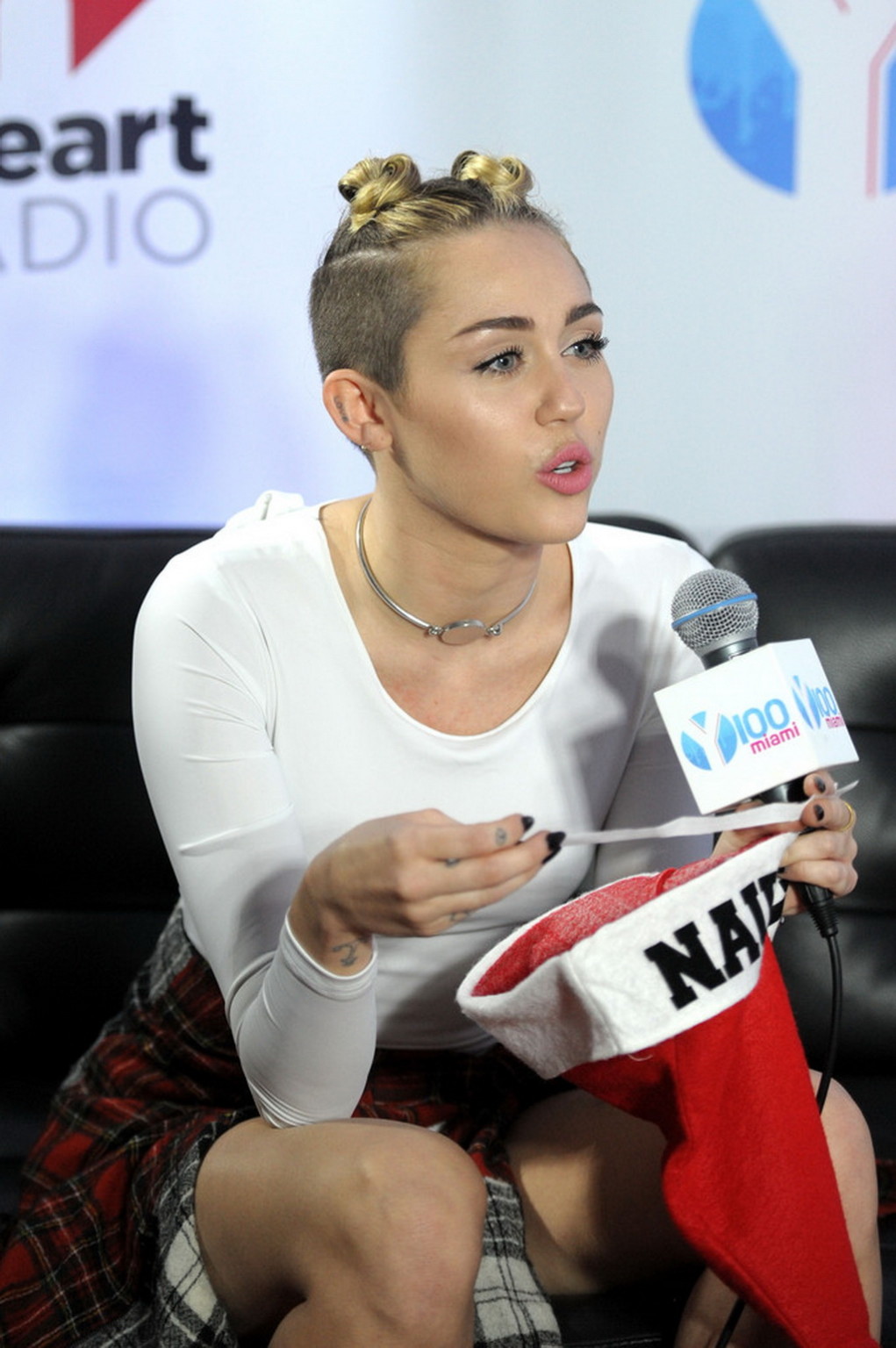 Miley Cyrus wearing white transparent bodysuit at Y100 Jingle Ball 2013 in Miami #75209768