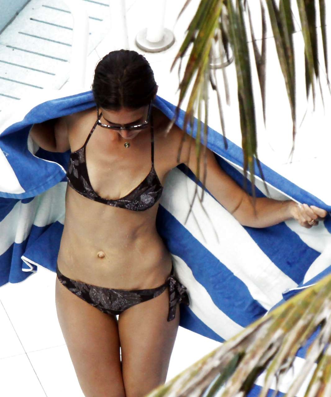 Katie Holmes looking very sexy in bikini on pool paparazzi pictures #75295683
