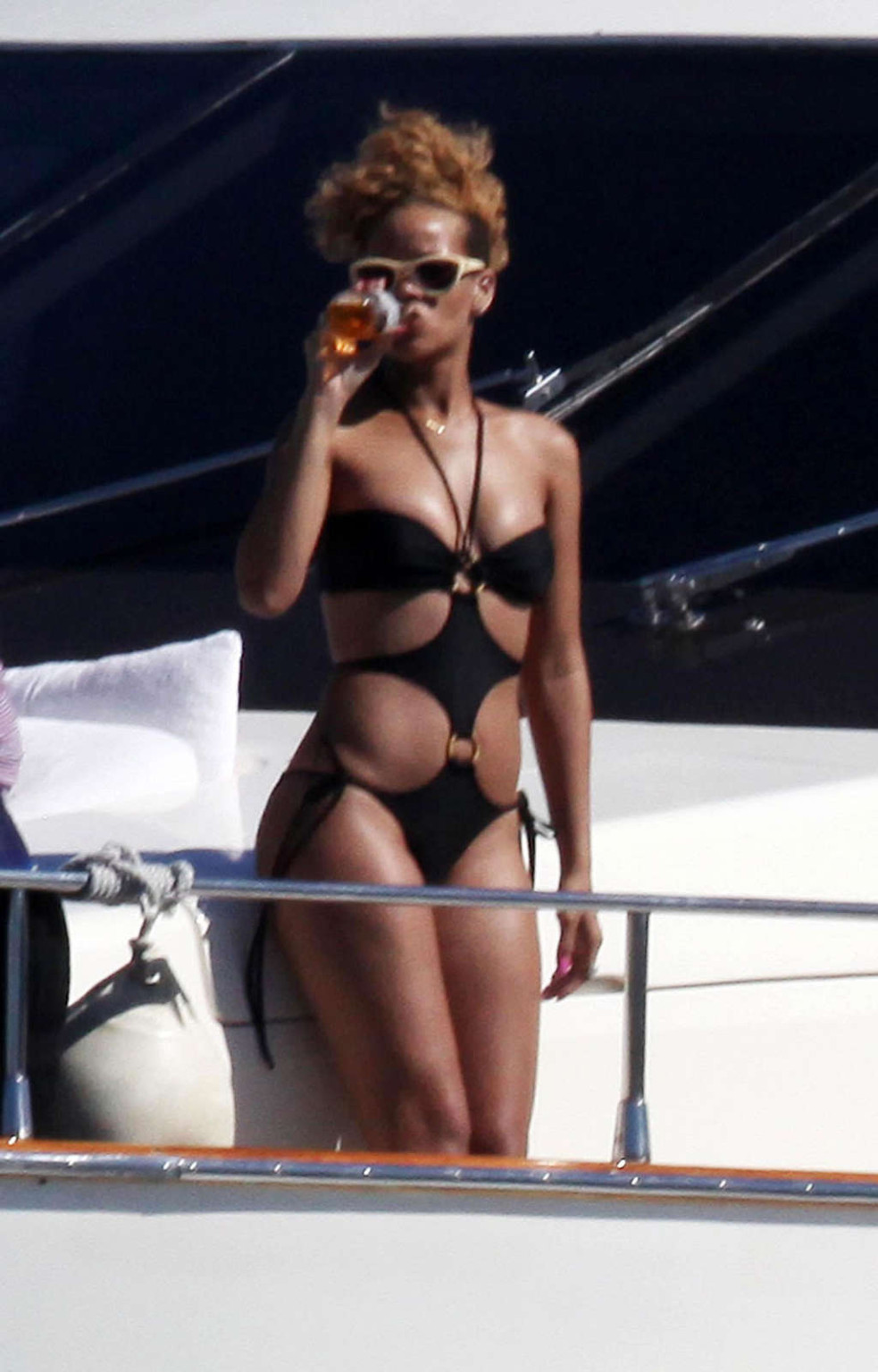 Rihanna looking sexy and hot in black bikini on yaht paparazzo photos #75364845