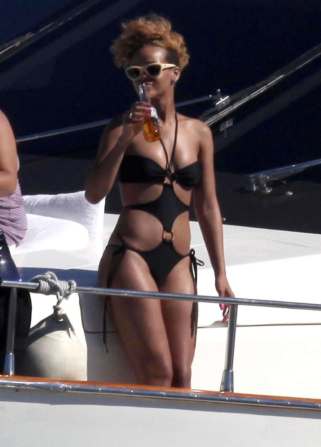 Rihanna looking sexy and hot in black bikini on yaht paparazzo photos #75364909